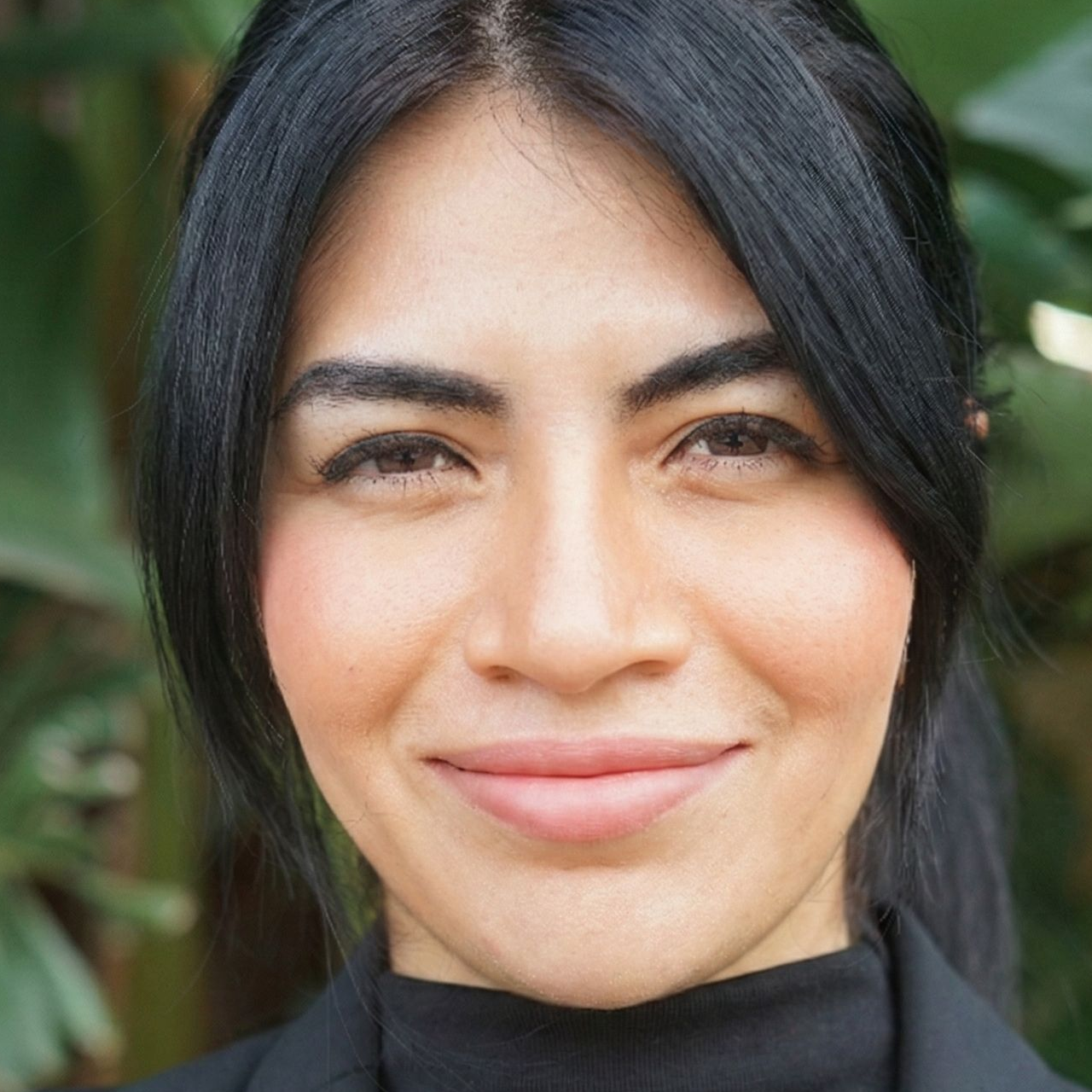 Portrait of Katya Flores Vargas, founder of Envision Dental Arts