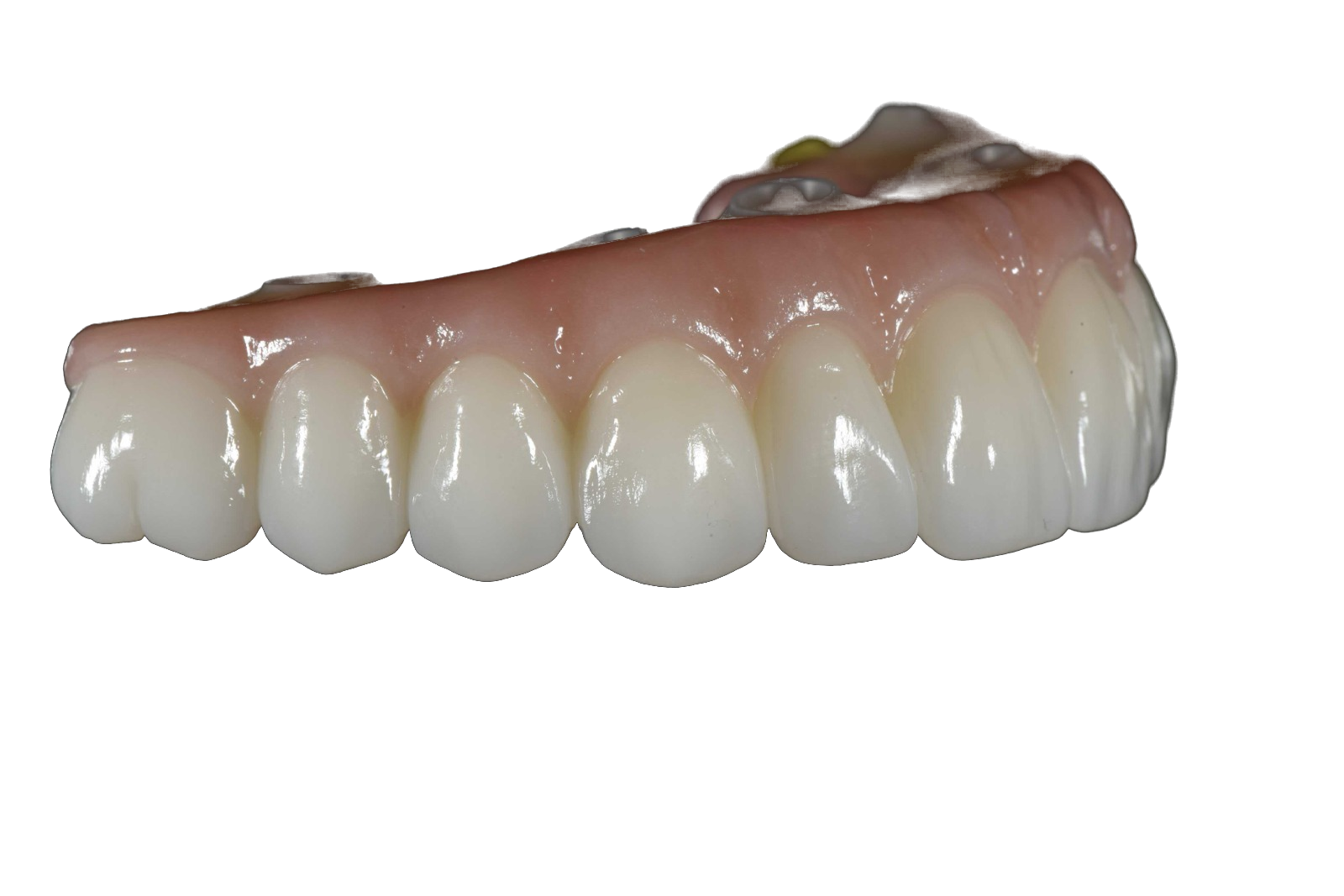 Finished arch held by gold tweezers